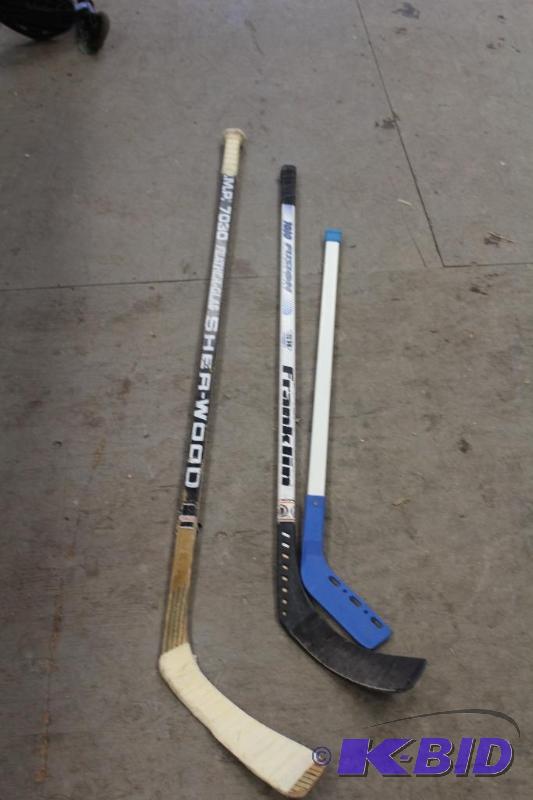 lot 76 image: 3 Hockey Sticks ...