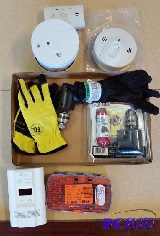 lot 11 image: 2 Kiddie smoke alarms  2 CO Alarms  Drill bit set  2 pairs of gloves  2 drill 90 degree adapters