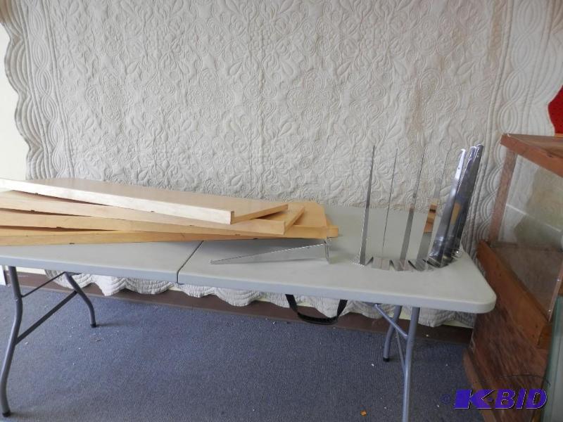 4 slat wall shelves and 8 brackets