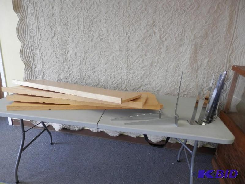 4 slat wall shelves and 8 brackets