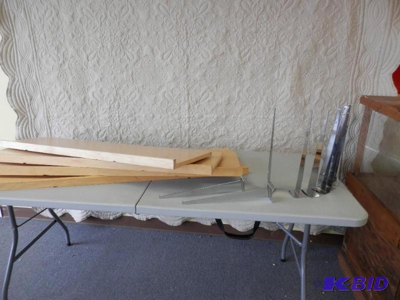 4 slat wall shelves and 8 brackets