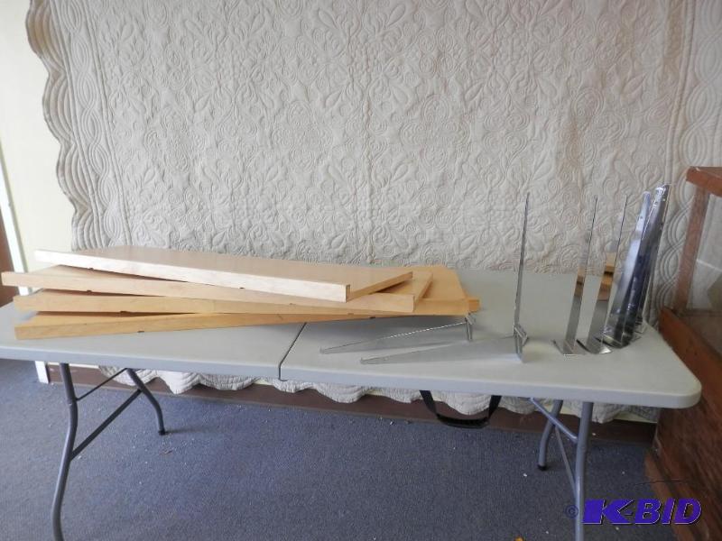 4 slat wall shelves and 8 brackets