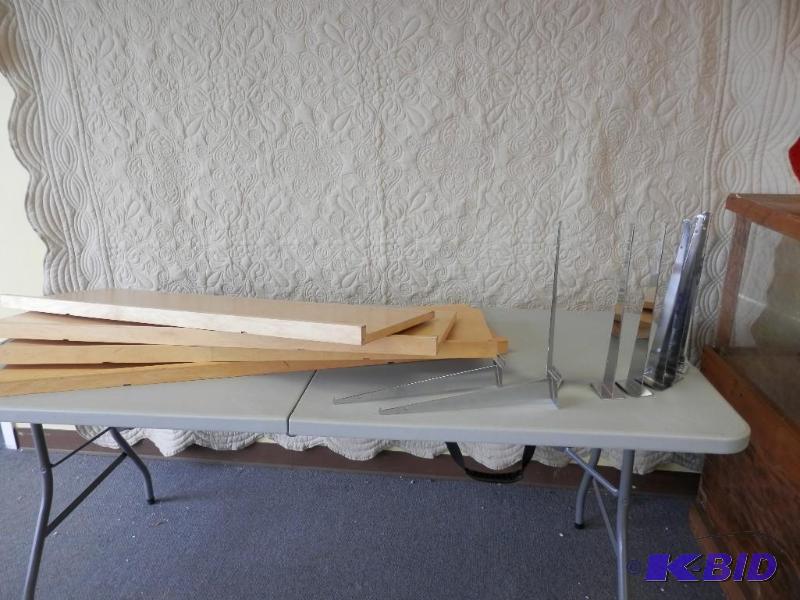 4 slat wall shelves and 8 brackets
