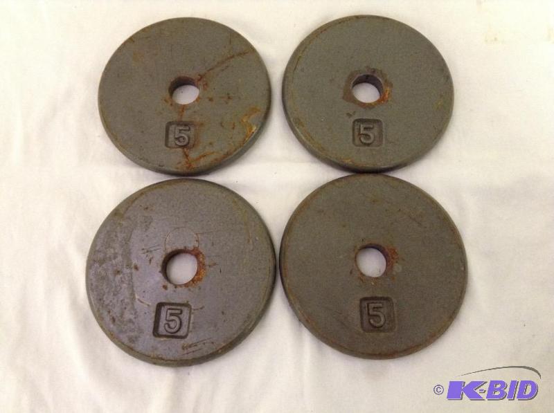 Four 5 pound weights