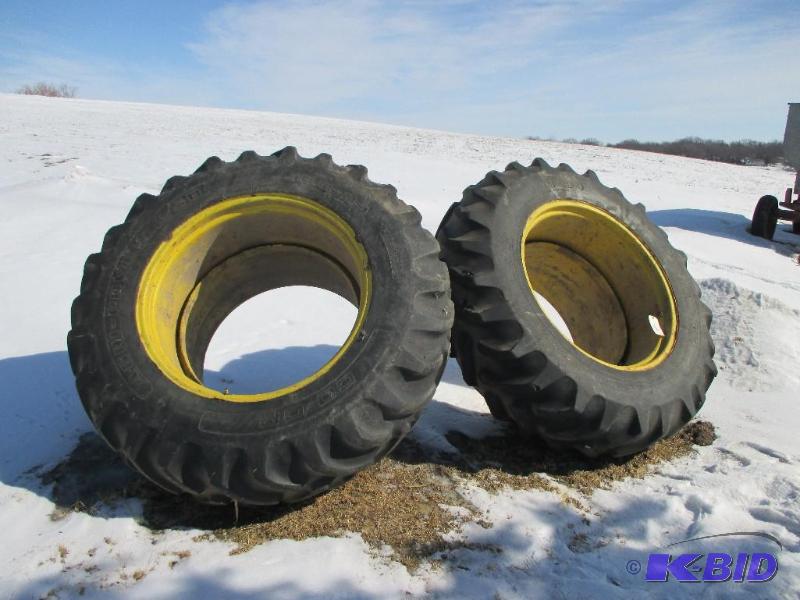 lot 12 image: Tractor duals 16.9-34 Coop tires, 50% tread...