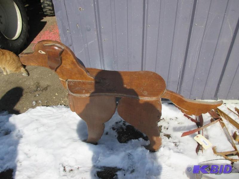 lot 21 image: Wooden dog...