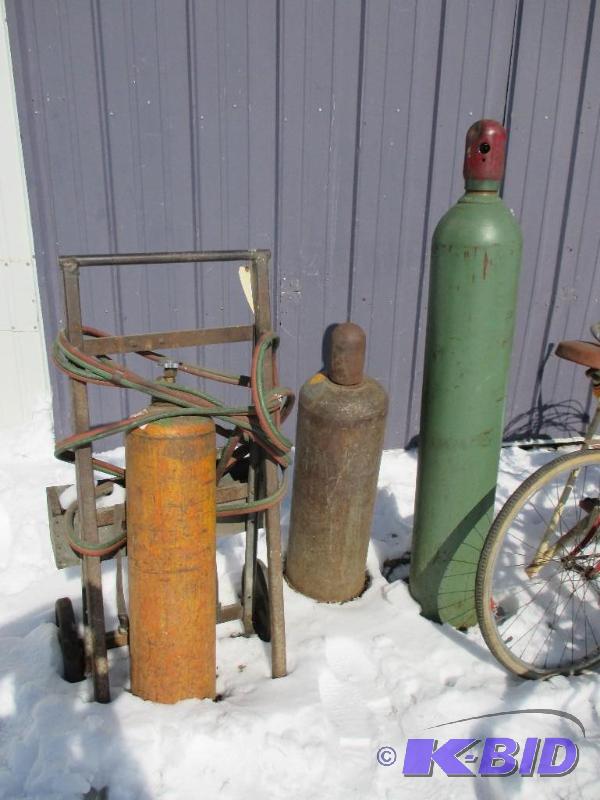 lot 23 image: Torch set and 3 tanks...