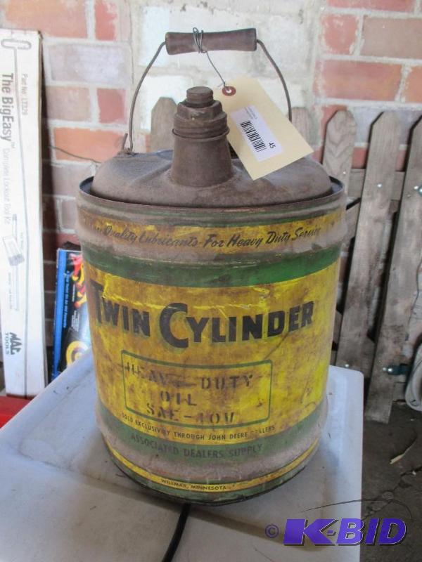 lot 45 image: Antique John Deere oil can...
