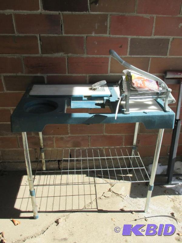 lot 60 image: Fish cleaning table with french fry cutter at...