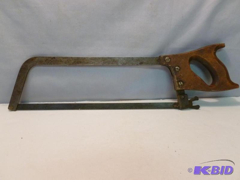 lot 113 image: Vintage Willen wood handled meat saw that mea...