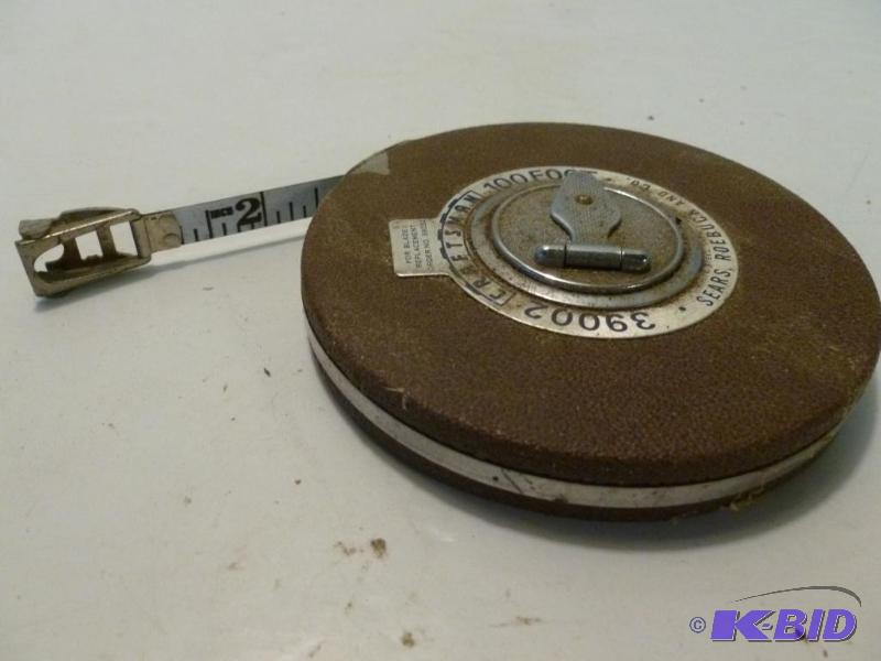 lot 115 image: Craftsman 100 ft steel tape measure....
