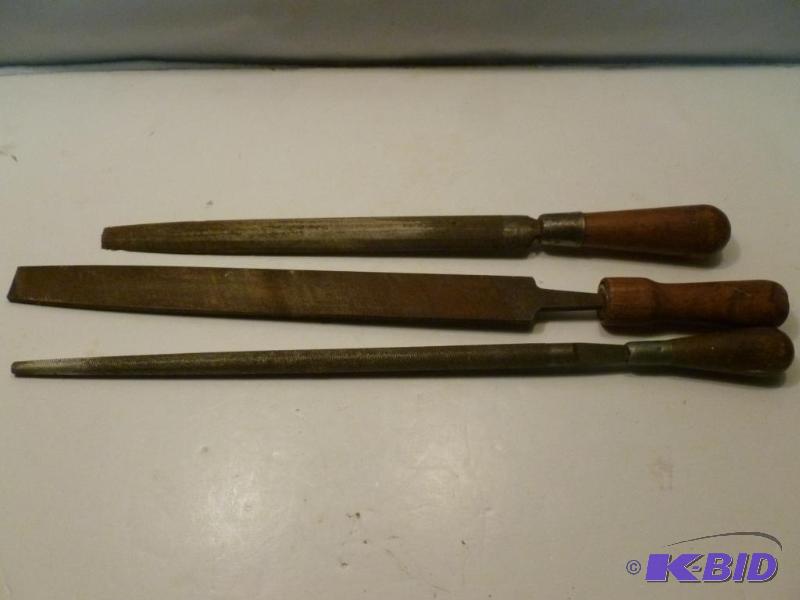 lot 147 image: Lot of three large wood handled files that me...