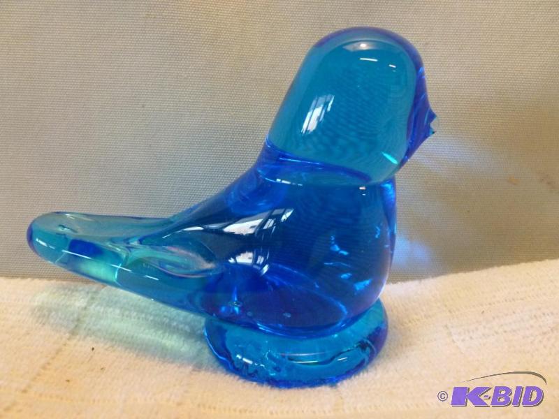 lot 179 image: Beautiful solid glass blue bird that measures...