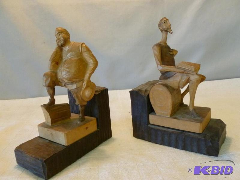 lot 244 image: A pair of large hand tooled wooden bookends t...