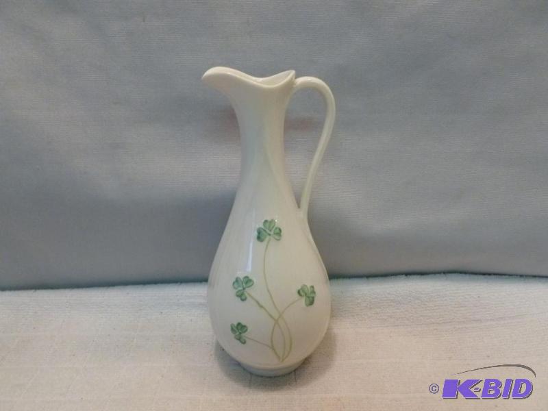 lot 322 image: Belleek porcelain handled bud vase that measu...