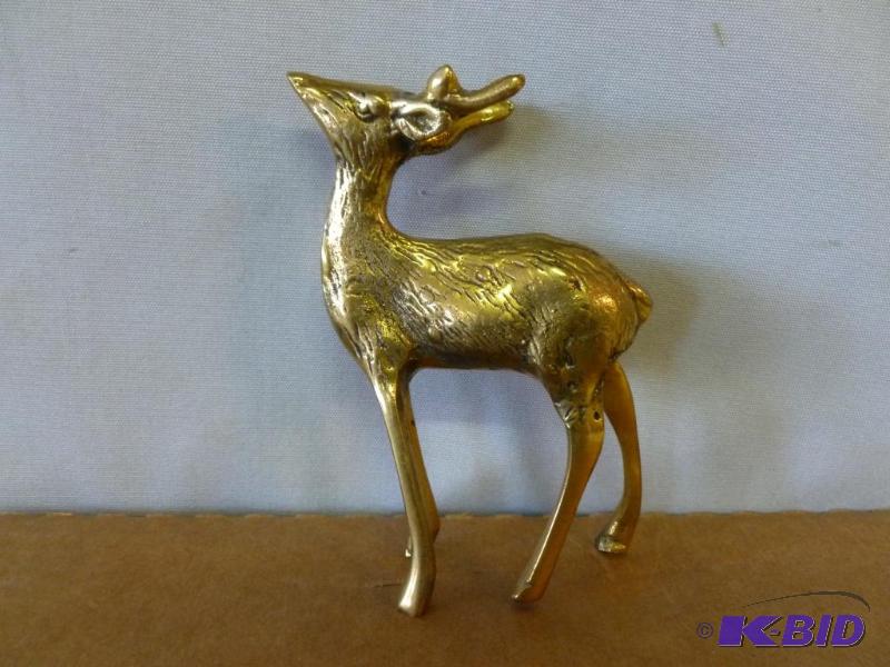 lot 39 image: Cast brass deer figurine that measures 2 34&...