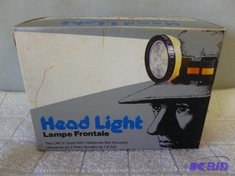 lot 44 image: Over the hat head light, new in the box....