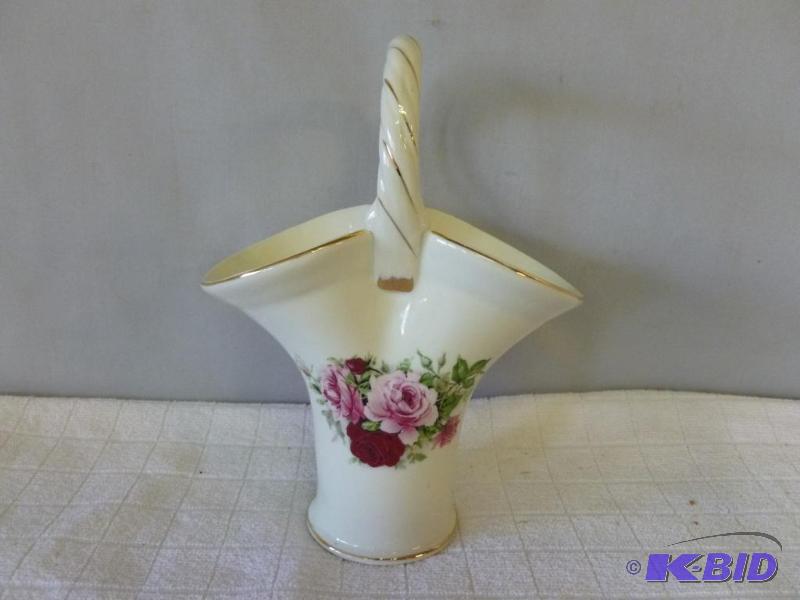 lot 46 image: Beautiful porcelain basket that measures 4 1...
