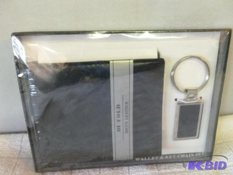 lot 68 image: Mens leather bi-fold wallet and key chain se...