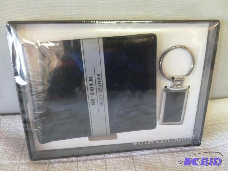 lot 69 image: Mens leather bi-fold wallet and key chain se...