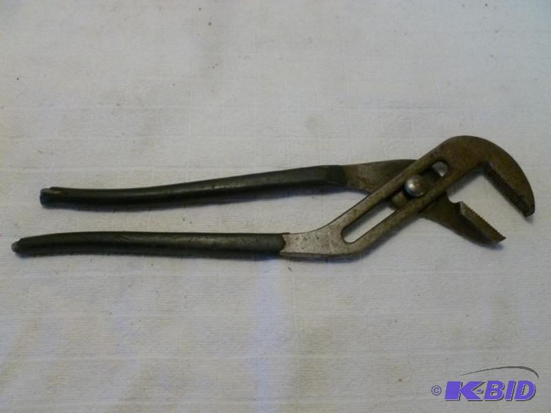 lot 98 image: Large channel lock type wrench that measures ...
