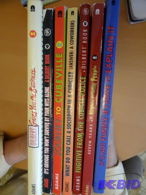7 Dibert Comic Books...