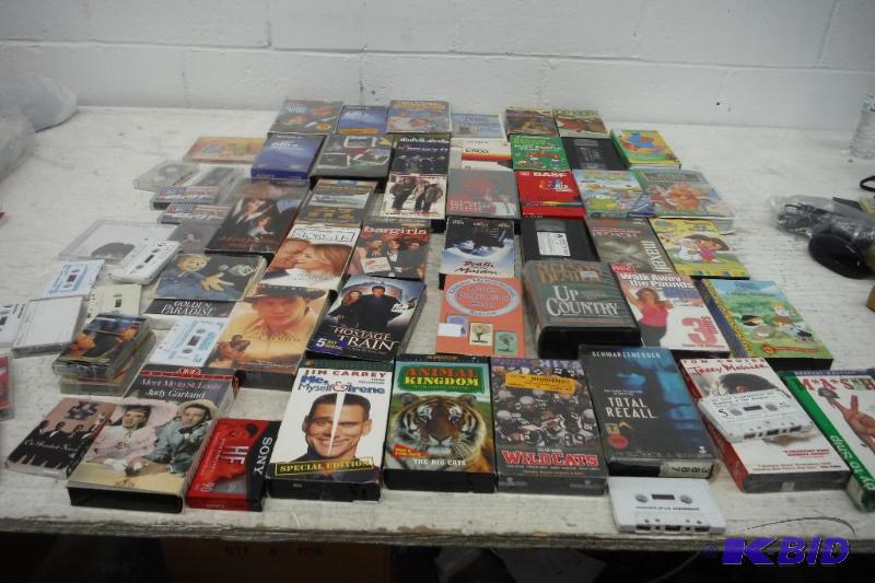 lot 222 image: Lot of 63 VHSs and Cassette tapes