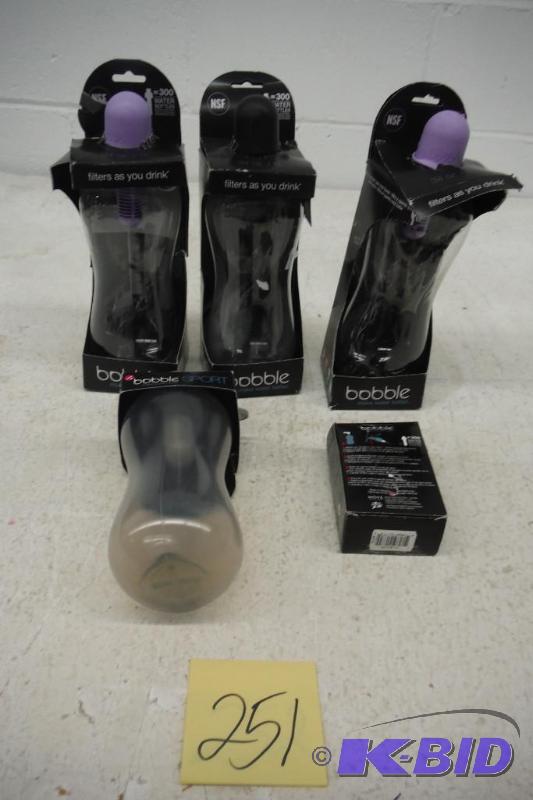 lot 251 image: Lot of 4 Bobble bottles Nd a 2 pack of filters