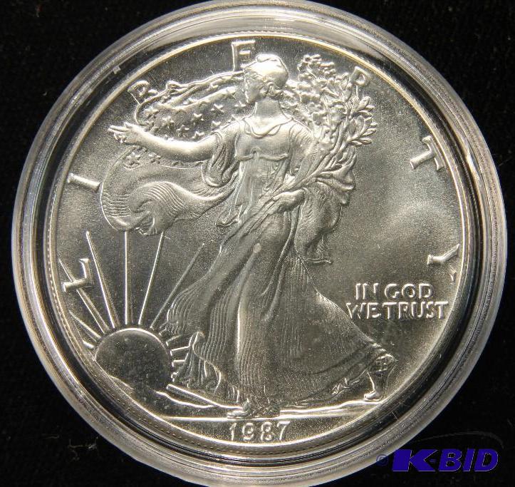 1987 US SILVER EAGLE 1 TROY Oz. .999 FINE SILVER IN AIRTIGHT HOLDER