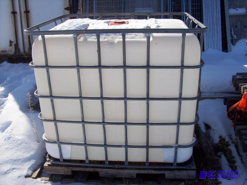 lot 6 image: 275 gallon plastic holding tank, with metal c...