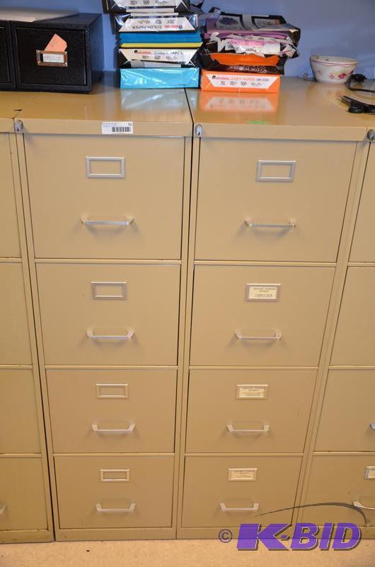 lot 52 image: Two metal four drawer filing cabinet 15x28x52...