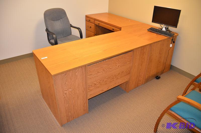 lot 7 image: Oak wood desk, L shaped. Divides into 3 secti...