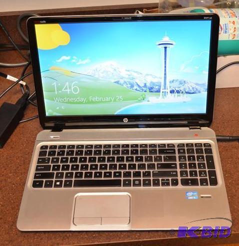lot 73 image: HP Envy m6 laptop computer appears to have wi...