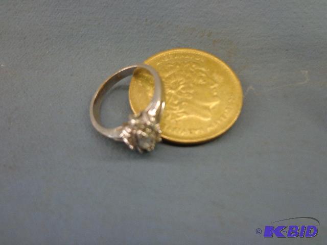 lot 6 image: Girls Ring and Foreign&nbspCurrency   Ring h...