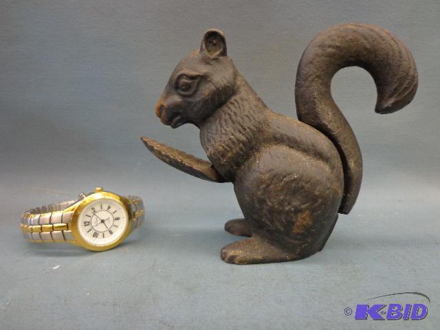 lot 64 image: Watch and Squirrel Nut Cracker   Watch is Ann...