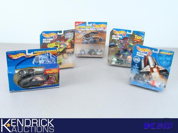 lot 16 image: 4 Hot Wheels Vintage MINT IN BOX Action Packs, and 1 Hot Wheels Treasure Hunt Pavement Pounder
