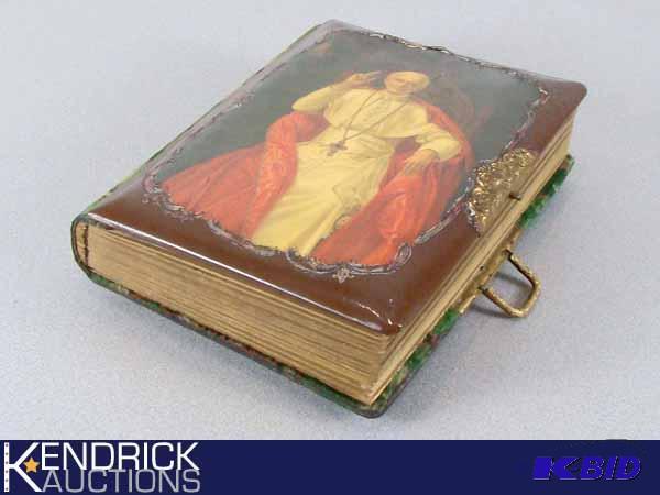 lot 22 image: Full Antique Photo Book with Picture of Pope on Front