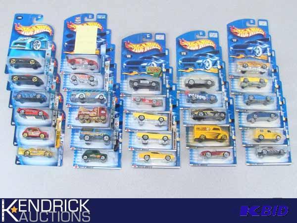 lot 40 image: 28 Vintage MINT ON CARD 2001-2004 Hot Wheels