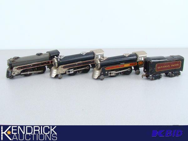 lot 55 image: 3 Vintage Metal MARX Toys Locomotive O-Scale Train Engines, and 1 Tender