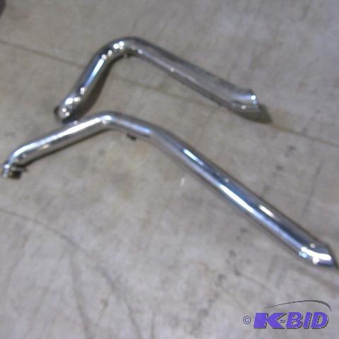 lot 24 image: Harley Exhaust Pipes