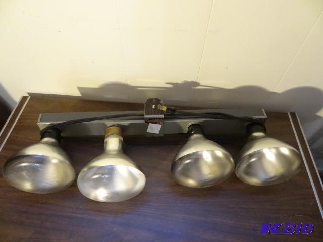 lot 136 image: 4 Blub Heat Lamp...