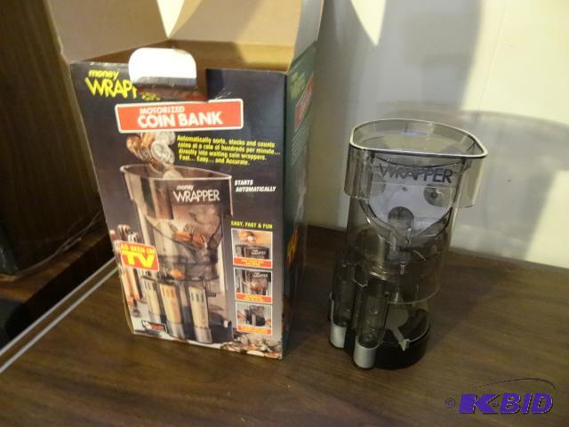 lot 137 image: Motorized Coin Bank...