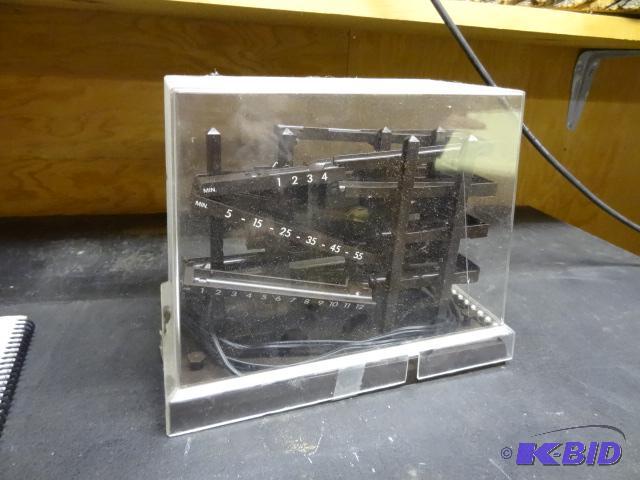 lot 96 image: Spencer Gifts Electric Clock Machine...
