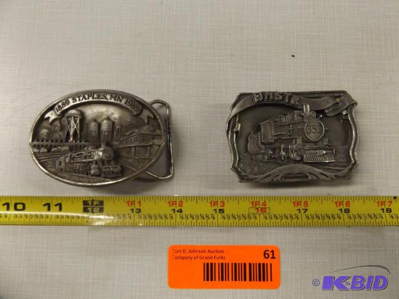 Two Metal Belt Buckle, one marked Staples, MN...