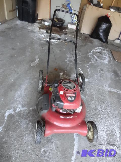 lot 1 image: Craftsman 21" high wheel push mower. 6.5...