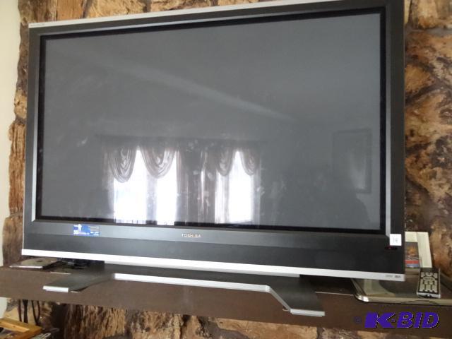 lot 14 image: Toshiba 50" plasma TV. Powers on but scr...