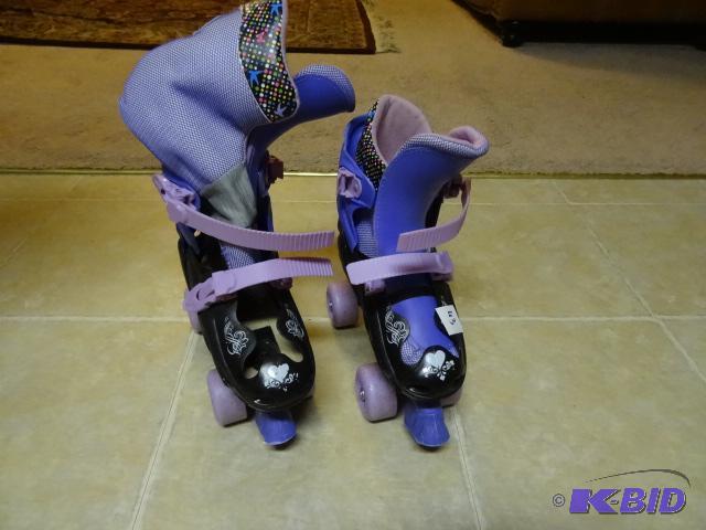 lot 43 image: Pair of kids roller skates...