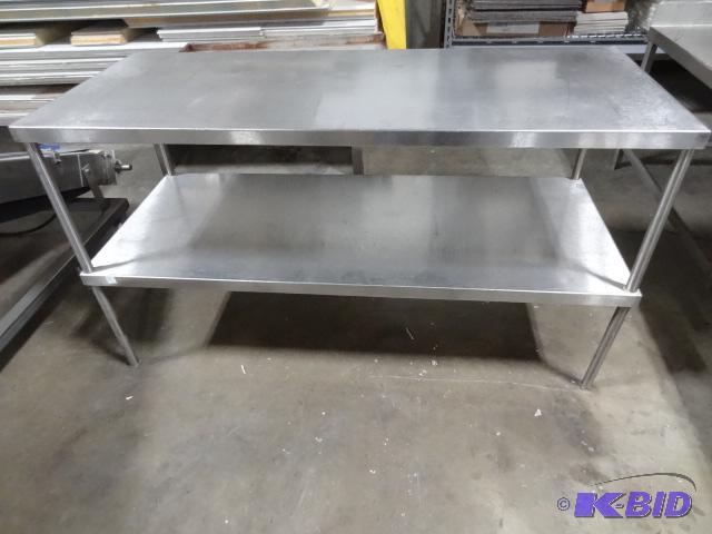 Stainless table. Bottom storage shelf. 65 x 2...