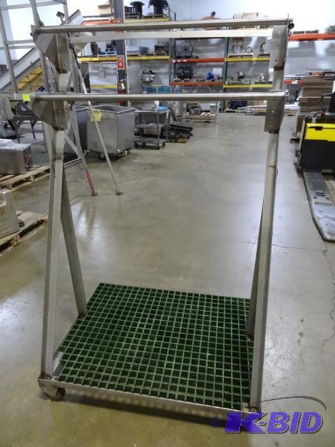 Stainless roll dispenser on wheels. Holds 36&...