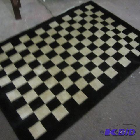 lot 13 image: Checkerboard Area Rug